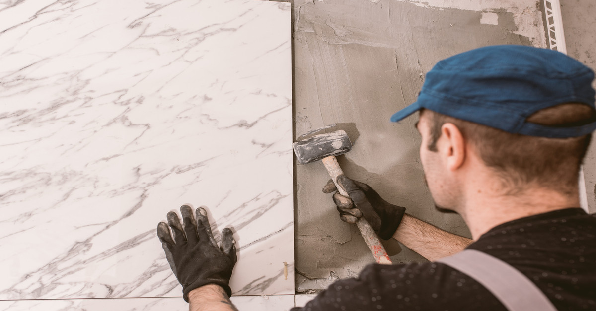 How do professionals seal grout?